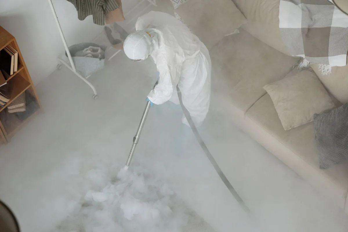 Biohazard cleanup technician in protective equipment, Monongahela, PA